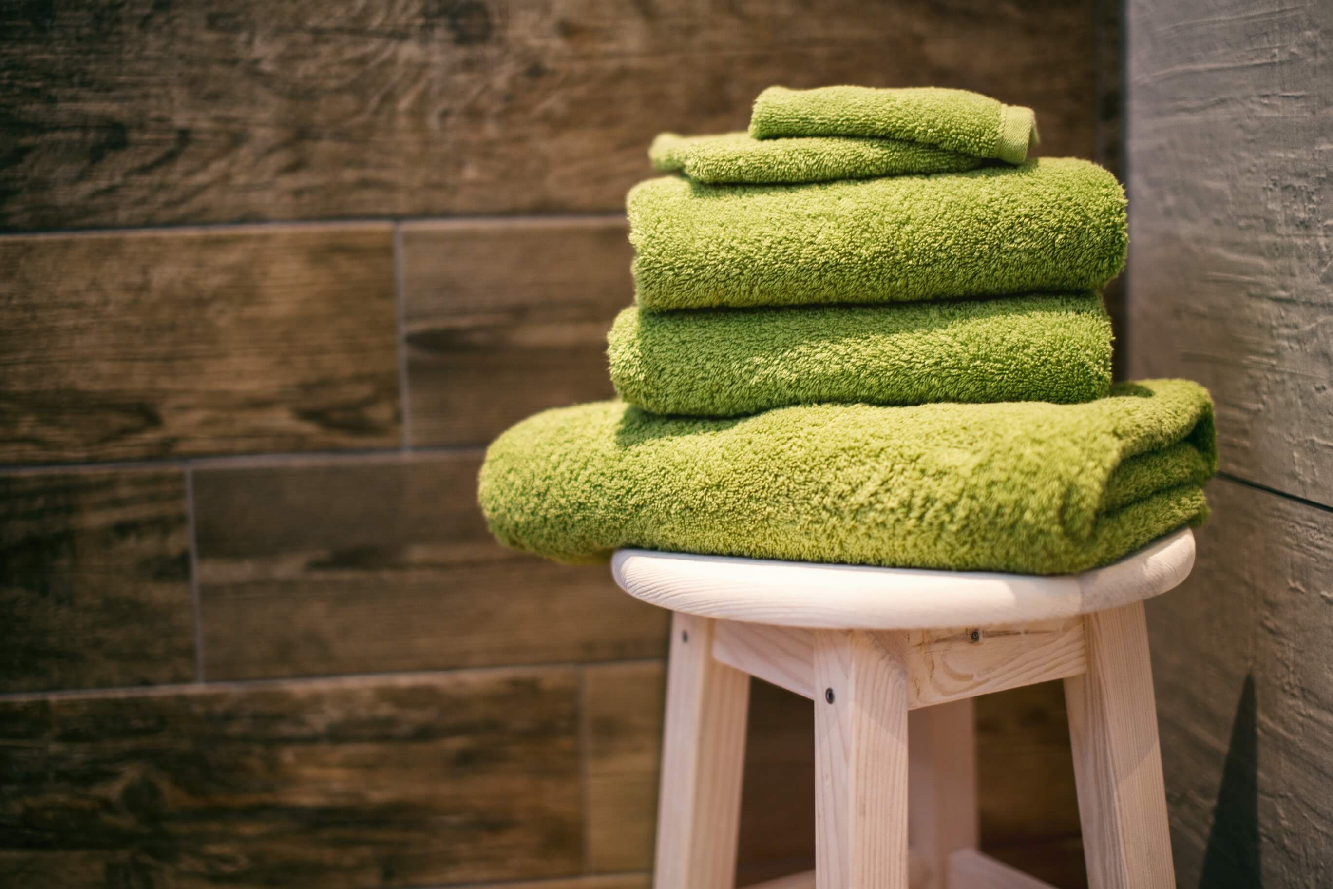 STack of towels. Changemaker. Donation.