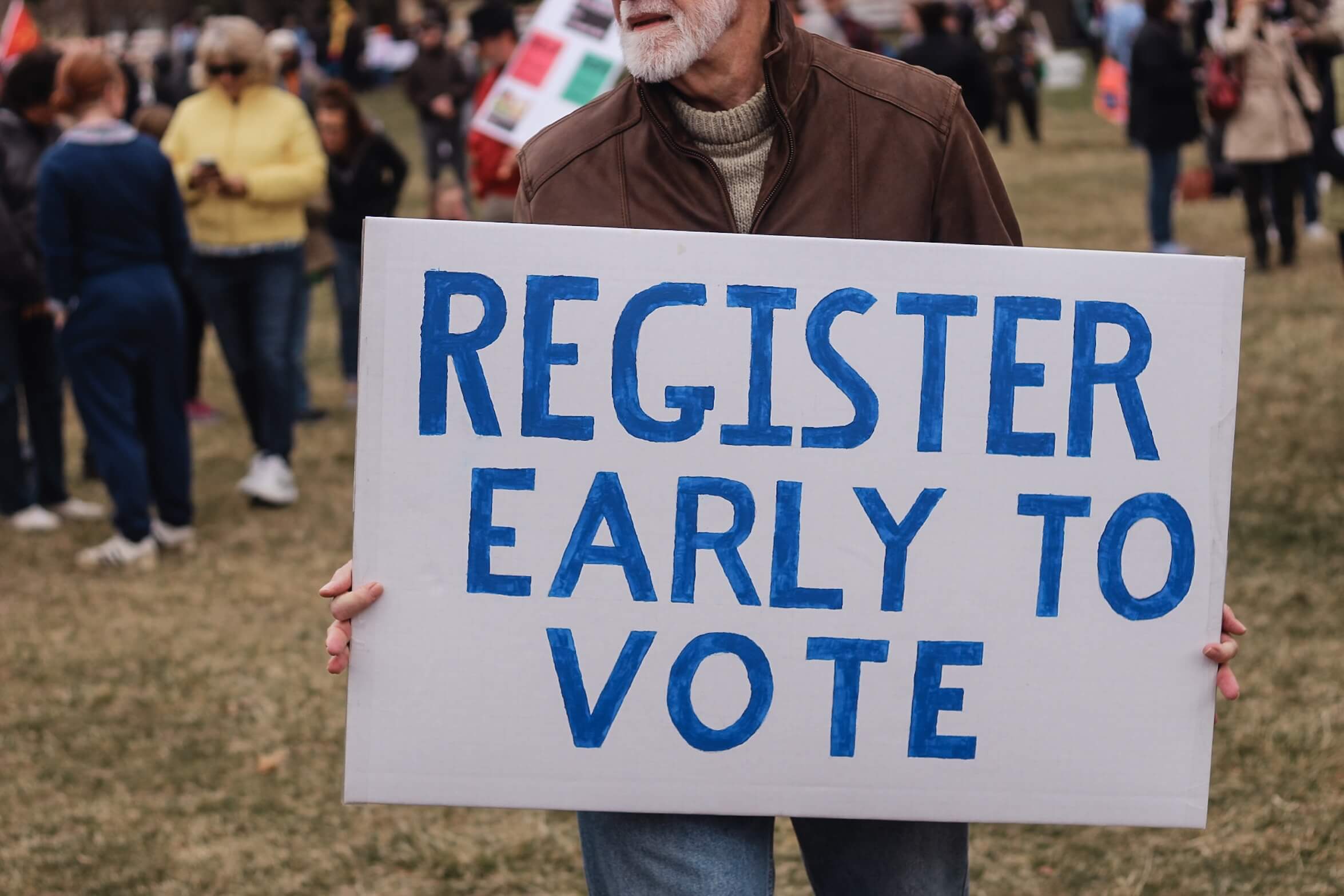 Register early to vote sign candidate