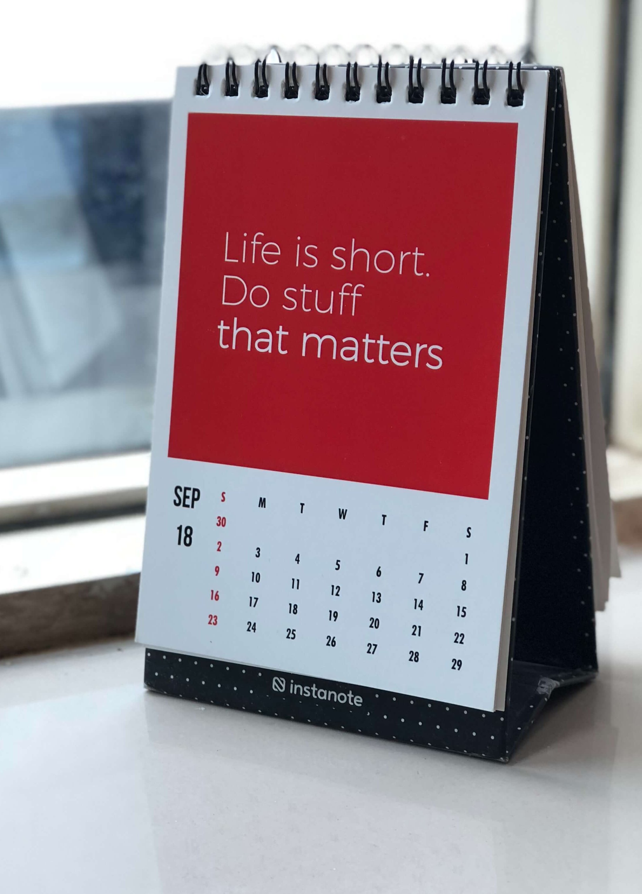 A calendar that says, "Life is short. Do stuff that matters." Resolution. Wish for a new year.