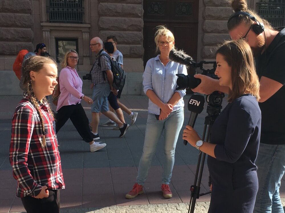 Global warming activist Greta in front of the Swedish Parliament Photo courtesy of Medium kids