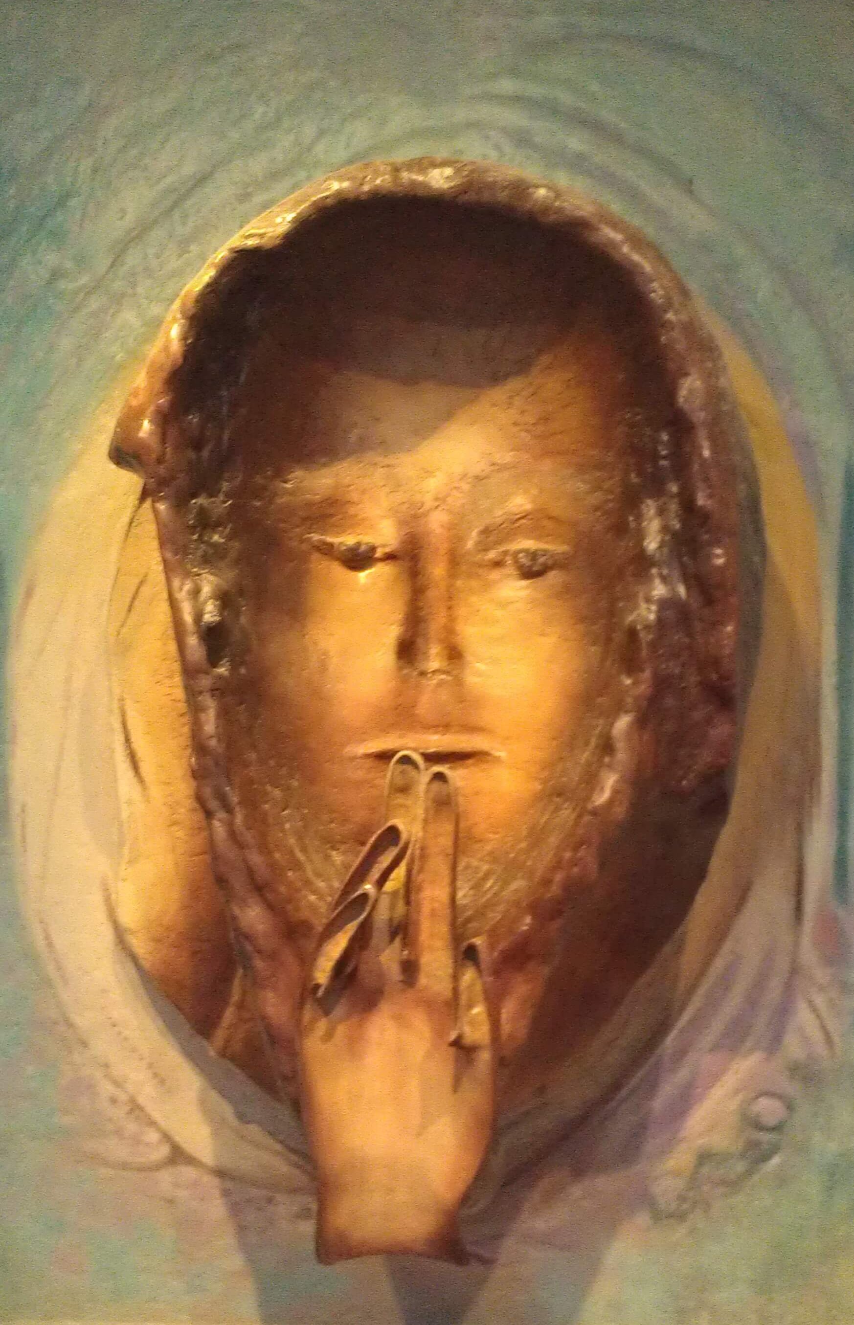 Inversion of sculpture with woman holding fingers to lips. Sensitivity Readers.