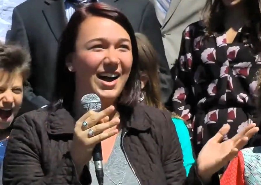 Kelsey Juliana, environmental activist, speaks at a press conference.