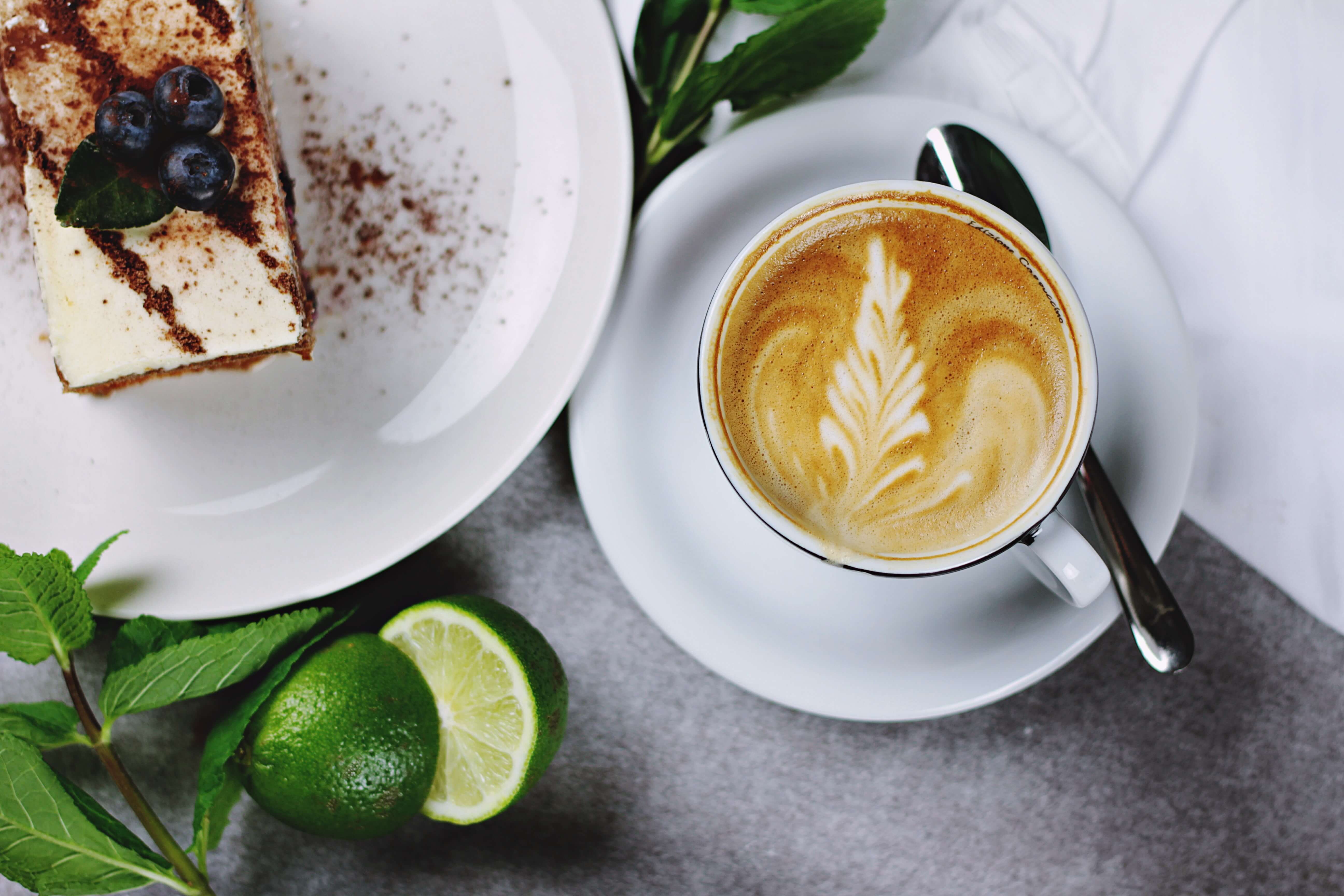Dessert and coffee on a table. Motivation.