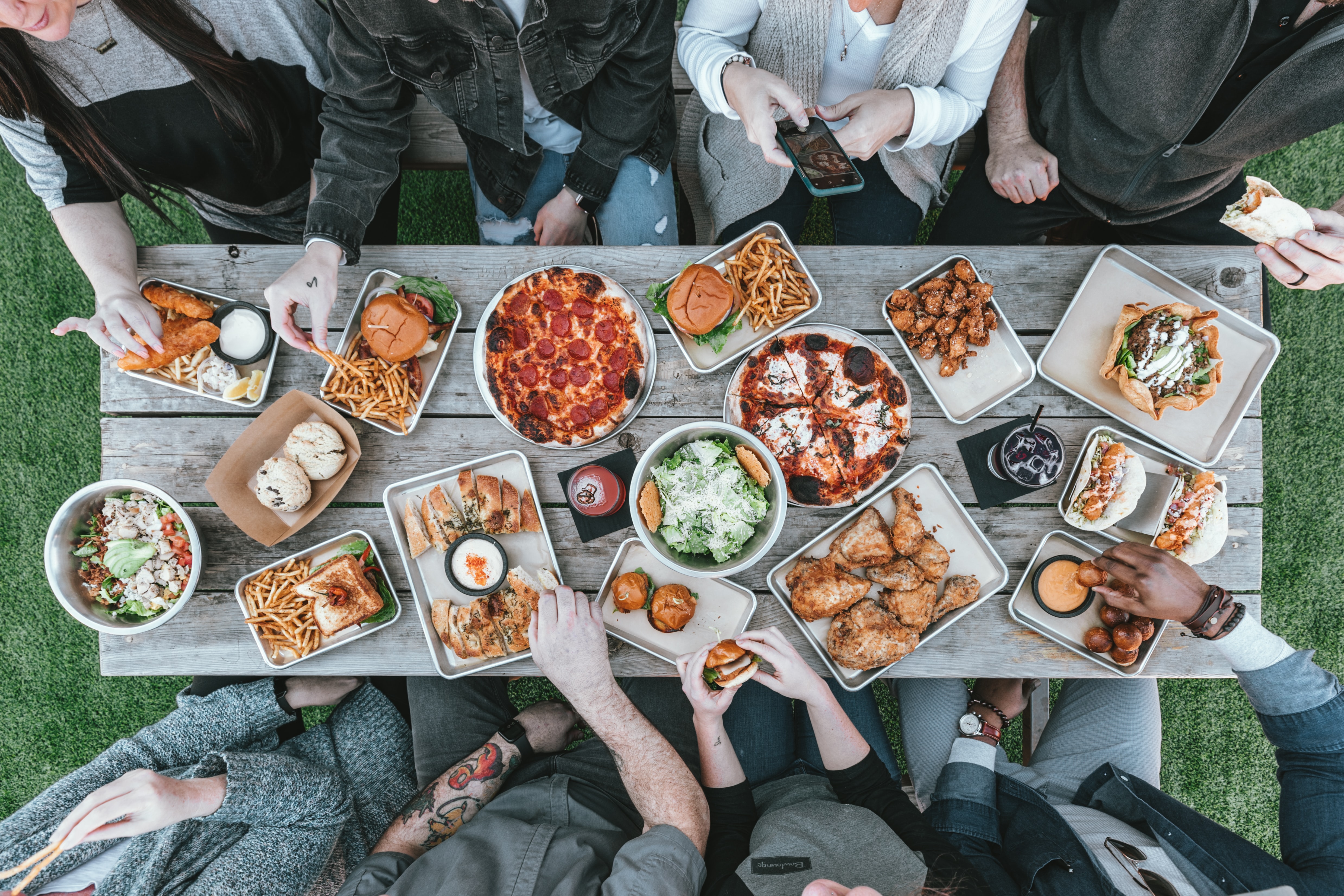 People sharing a meal. Movement support.