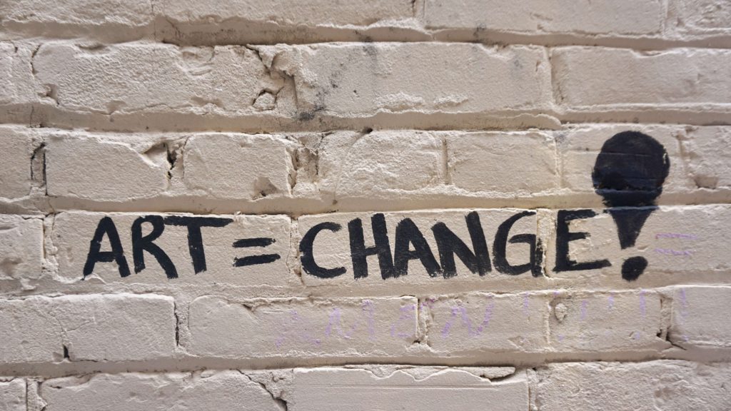 Art = change, written on a wall