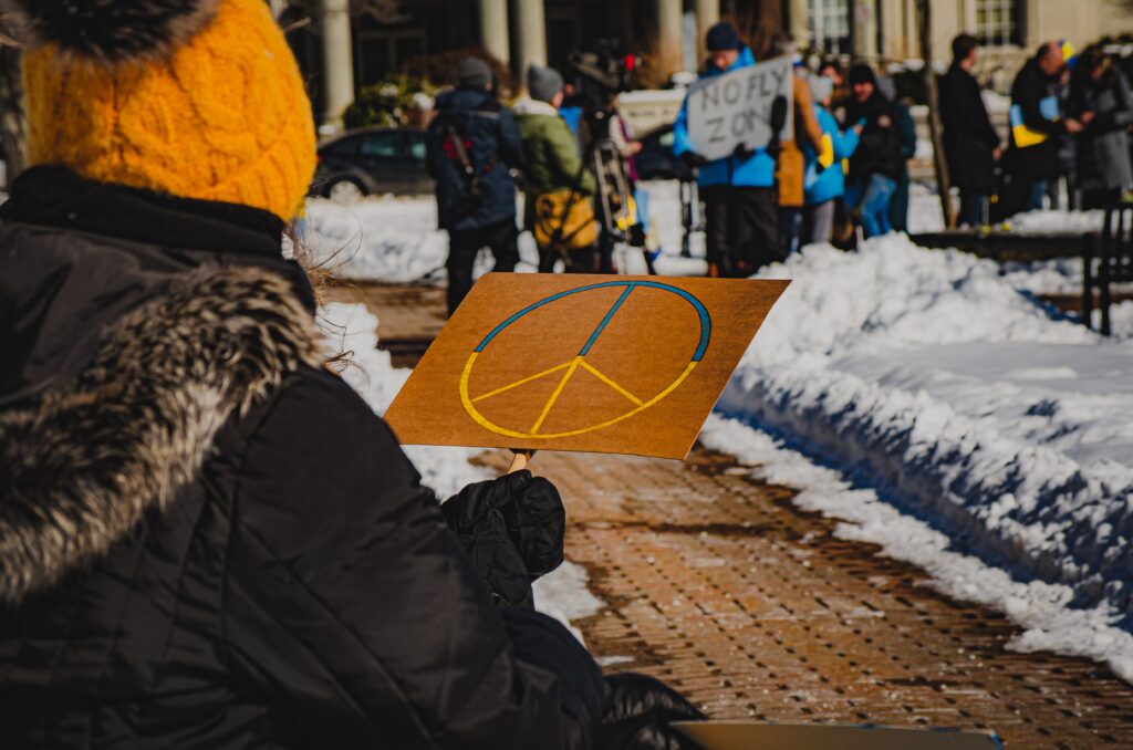 Ukraine peace activist sitting on the sidelines