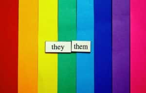 Pride colors with the words they/them.