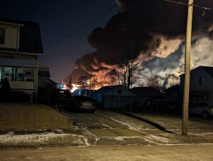 Fire and smoke from the East Palestine train derailment, taken from front yard. Environmentalist. Environment Protection. Environmental injustices examples.