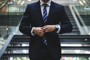 Person in a business suit. Personal power and privilege.