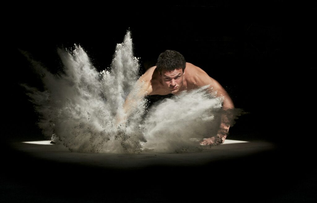 A white man slapping a pan of white powder, personal power and privilege.
