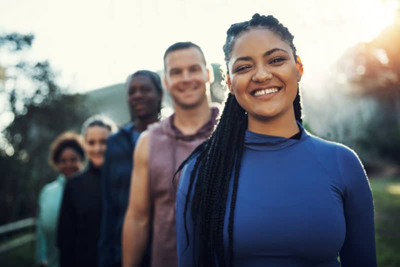 A group of happy activists in a row. Sustainable activism. Resources. 5-Step Activism Path.