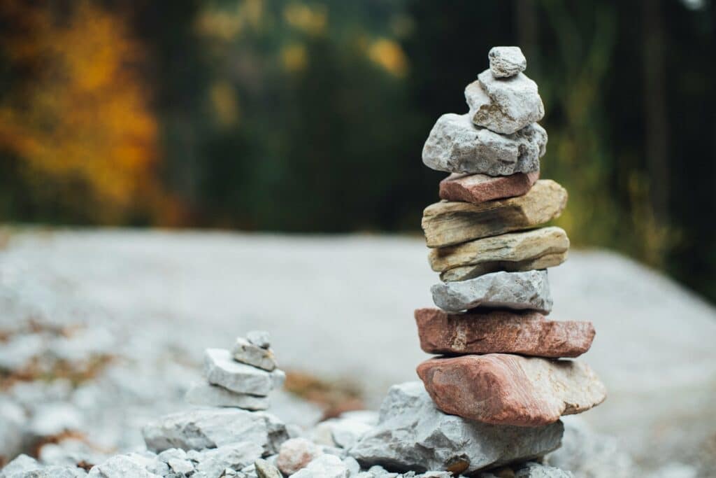 A stack of beautiful rocks in different colors conveys the idea of capacity building.